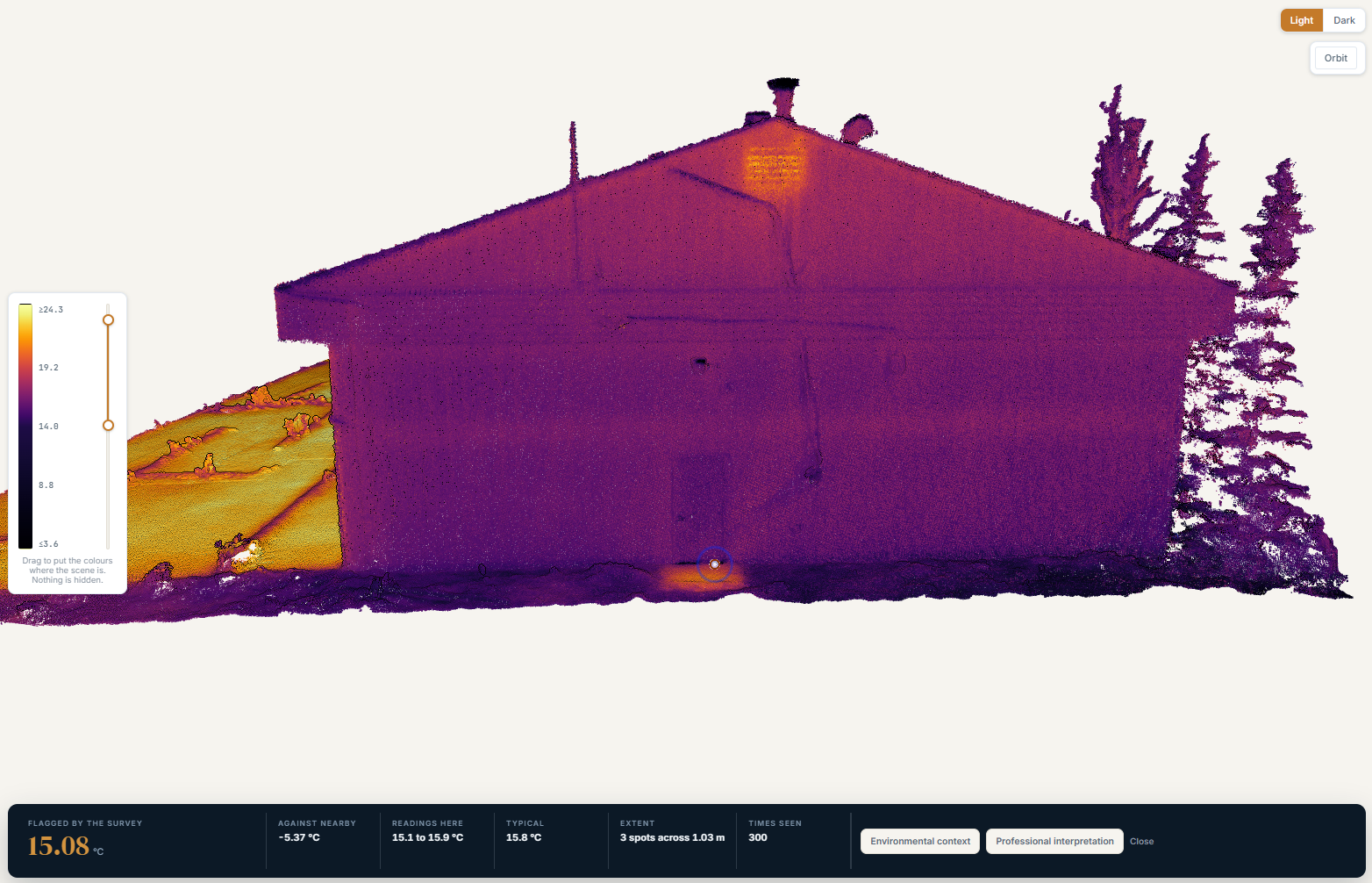 Full thermal building view showing the automatically flagged cold area beneath the east door.